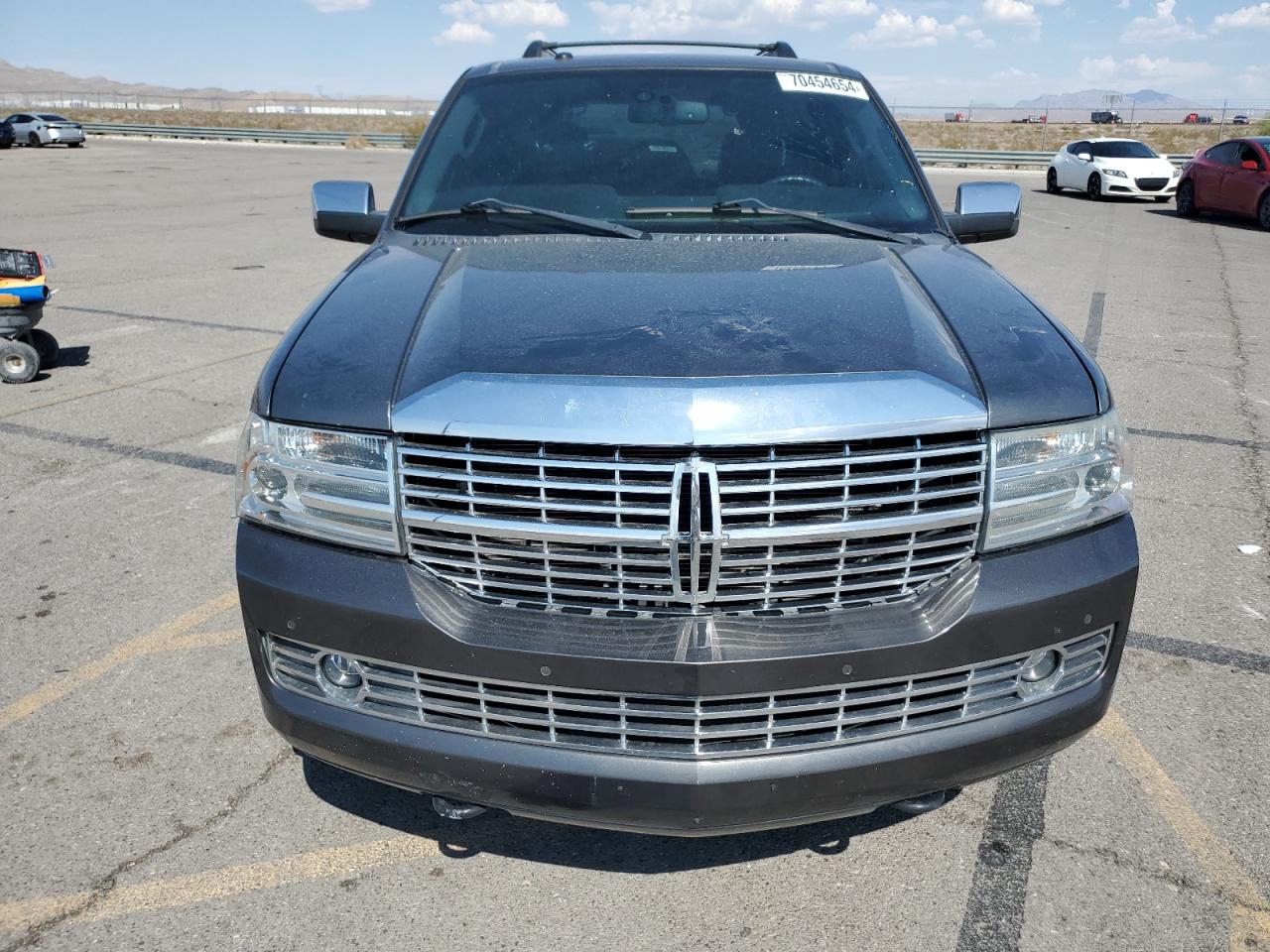 2011 Lincoln Navigator VIN 5LMJJ2H55BEJ09226 Copart auction photo, rear end / side damage thumbnail 5
