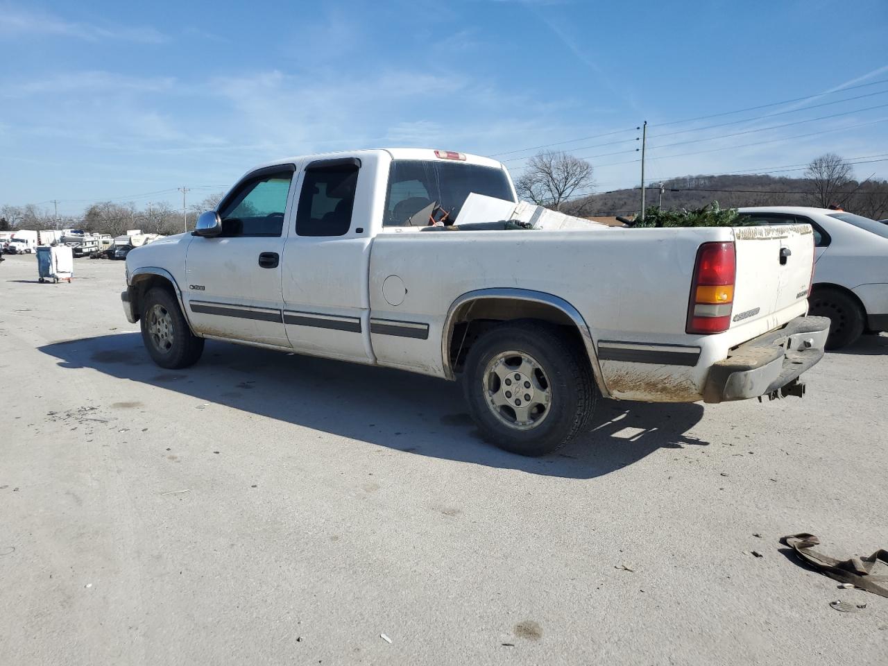 1999 Chevrolet Silverado VIN 2GCEC19T8X1184568 Copart auction photo, side / front end damage thumbnail 2