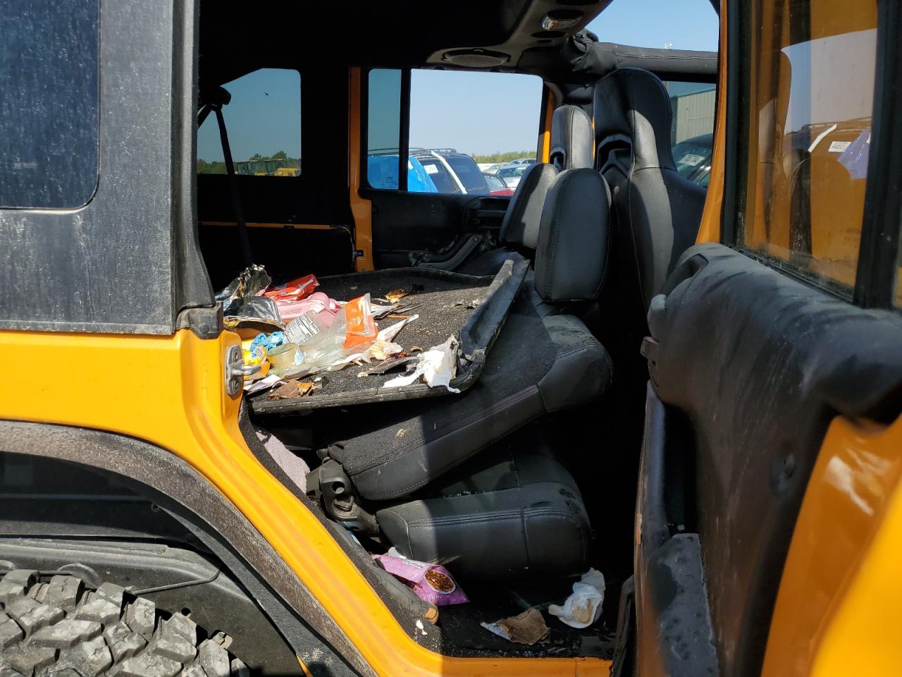 2012 Jeep Wrangler VIN 1C4BJWDG6CL129864 Copart auction photo, side / all over damage thumbnail 11