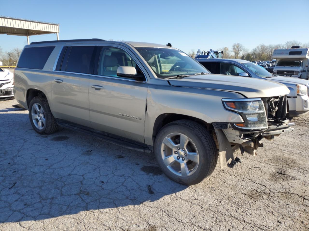 2015 Chevrolet Suburban VIN 1GNSKJKC9FR250686 Copart auction photo, front end / minor dent/scratches damage thumbnail 4