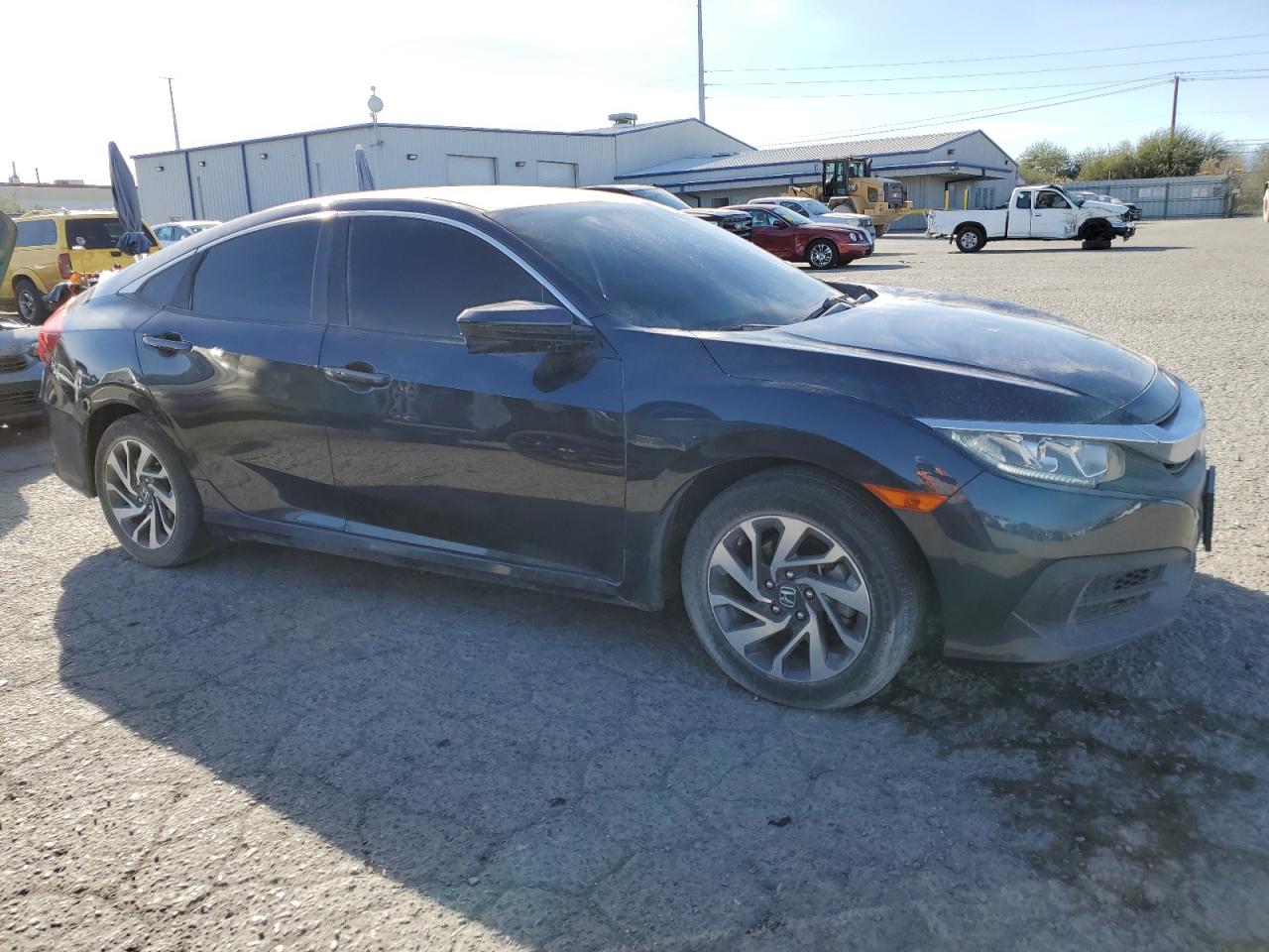 2017 Honda Civic VIN 19XFC2F74HE217362 Copart auction photo, side / front end damage thumbnail 4