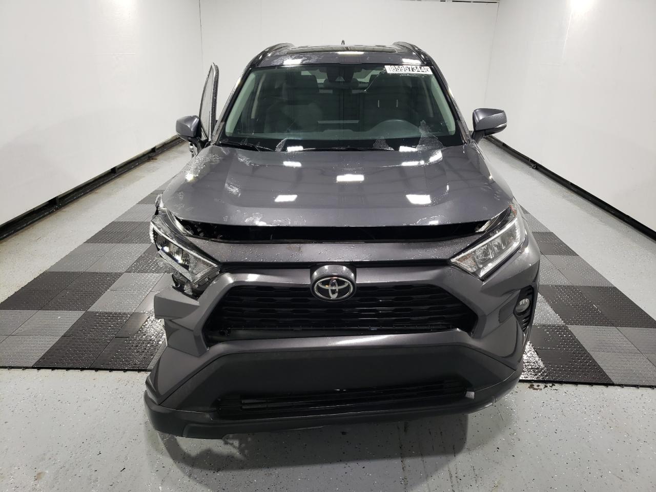 2020 Toyota RAV 4 VIN 2T3W1RFV8LW090853 Copart auction photo, side / front end damage thumbnail 5