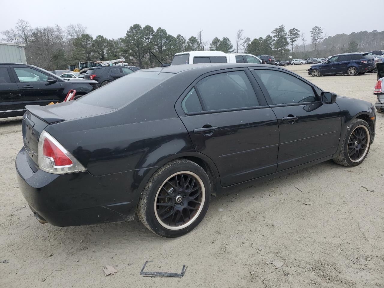 2009 Ford Fusion VIN 3FAHP07149R206969 Copart auction photo, rear end / minor dent/scratches damage thumbnail 3