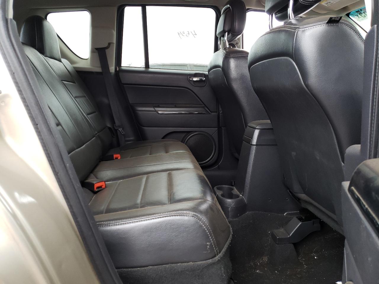 2010 Jeep Compass VIN 1J4NF5FB9AD599690 Copart auction photo, side / minor dent/scratches damage thumbnail 11