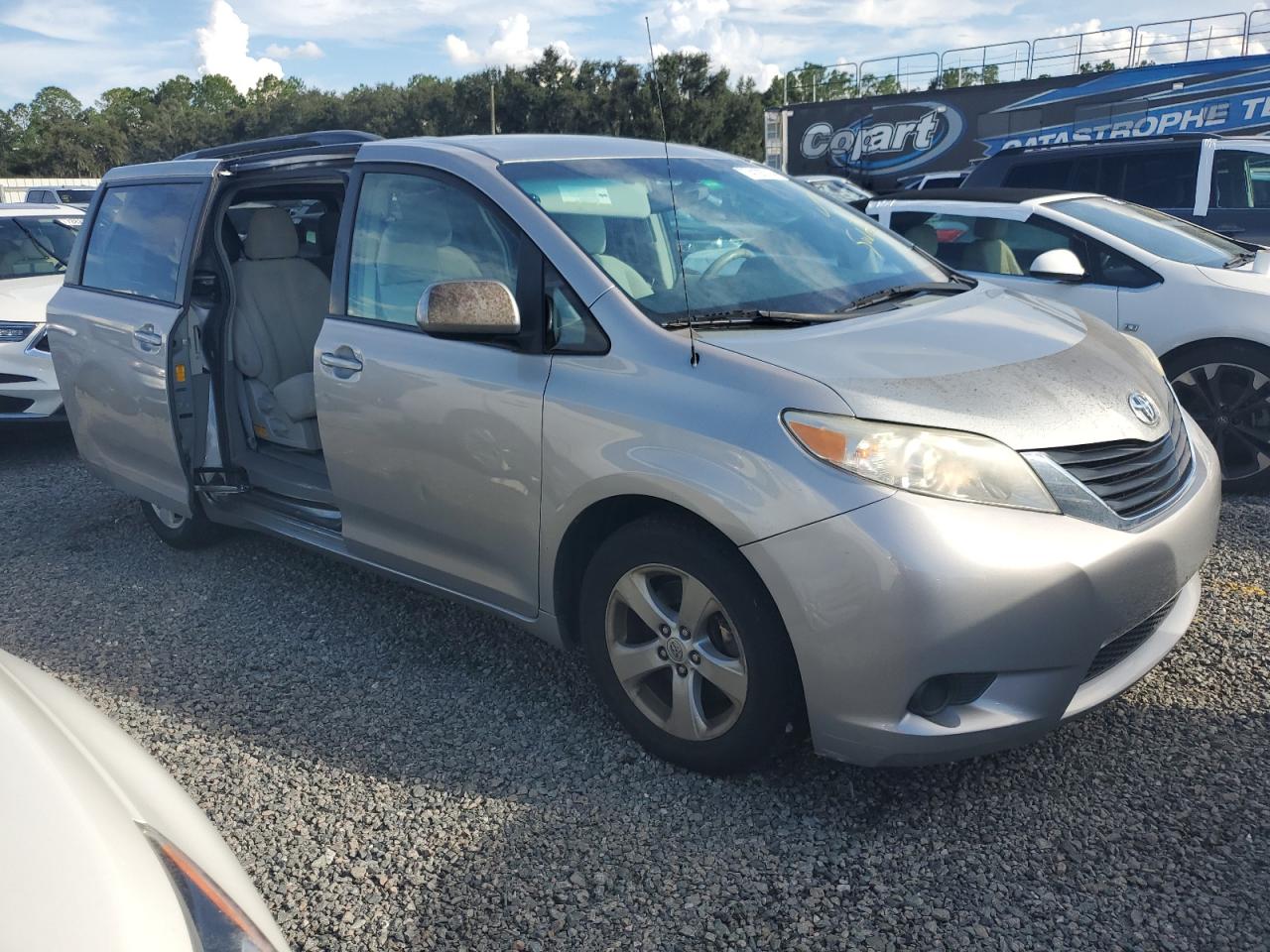 2014 Toyota Sienna VIN 5TDKK3DC7ES413059 Copart auction photo, water/flood damage thumbnail 4