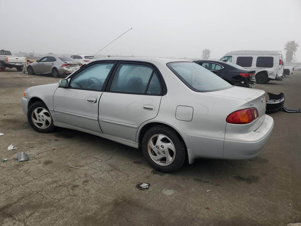 2001 Toyota Corolla VIN 1NXBR12EX1Z515543 Copart auction photo, vandalism damage thumbnail 2