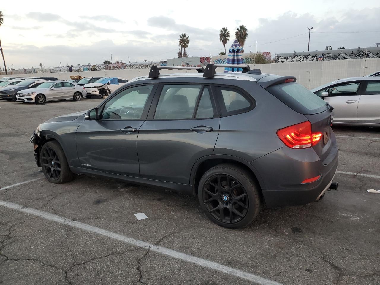 2014 BMW X1 VIN WBAVL1C54EVY20972 Copart auction photo, front end / minor dent/scratches damage thumbnail 2
