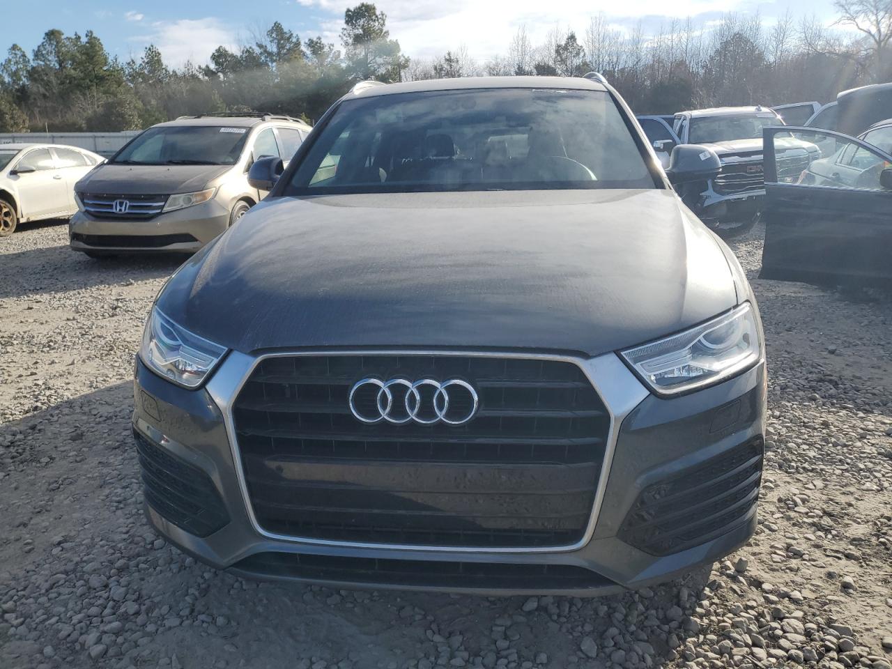 2018 Audi Q3 VIN WA1BCCFS1JR000879 Copart auction photo, vandalism damage thumbnail 5