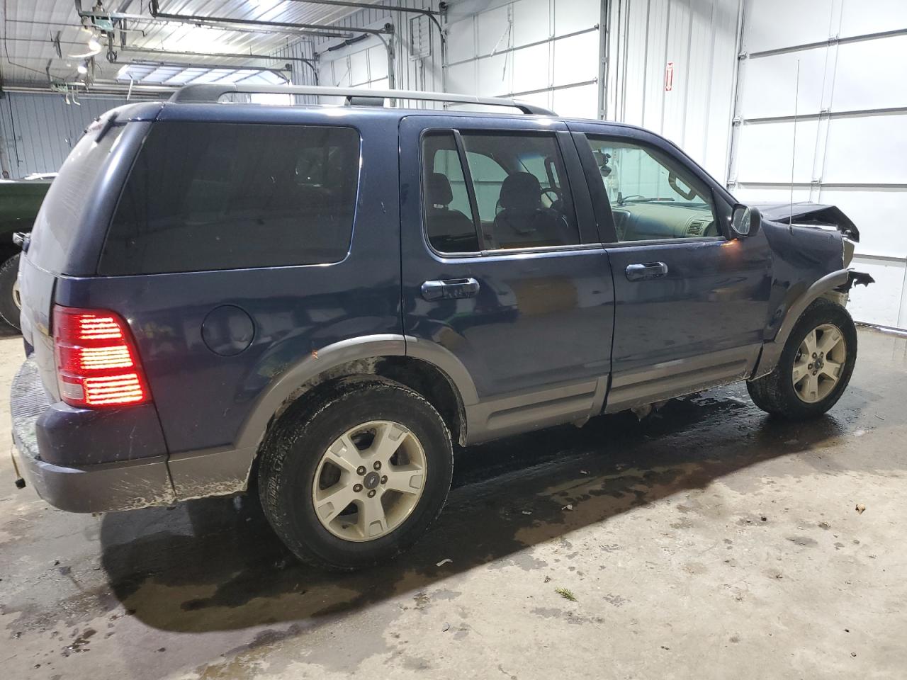 2003 Ford Explorer VIN 1FMZU63K53UA97216 Copart auction photo, front end / minor dent/scratches damage thumbnail 3