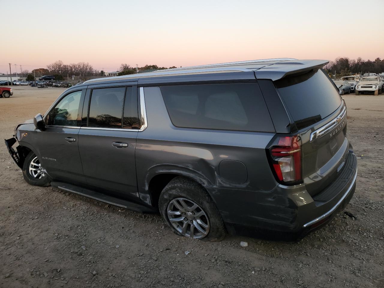 2021 Chevrolet Suburban VIN 1GNSCCKD2MR255257 Copart auction photo, side / front end damage thumbnail 2