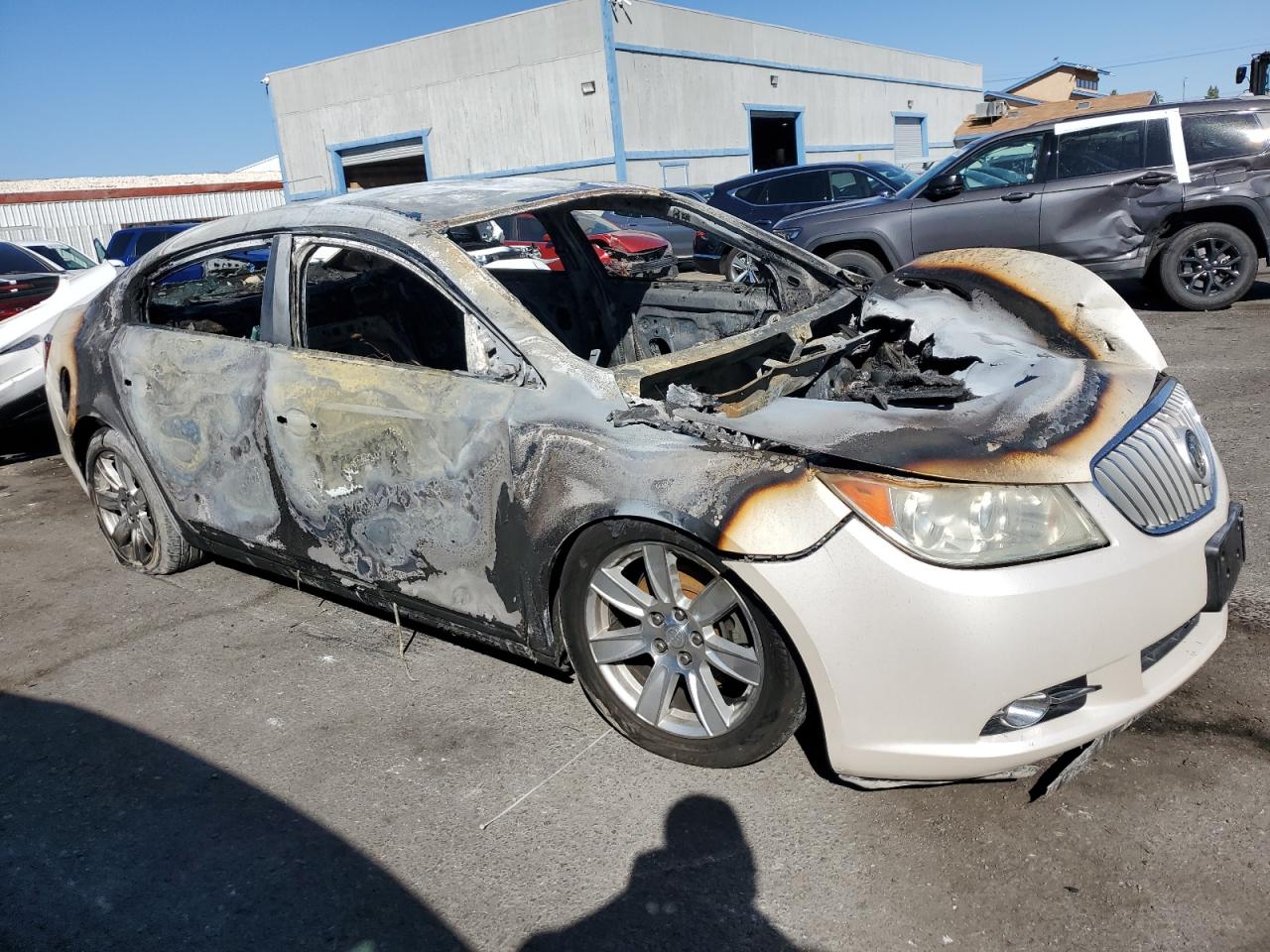 2012 Buick LaCrosse VIN 1G4GC5E34CF378096 Copart auction photo, burn damage thumbnail 4