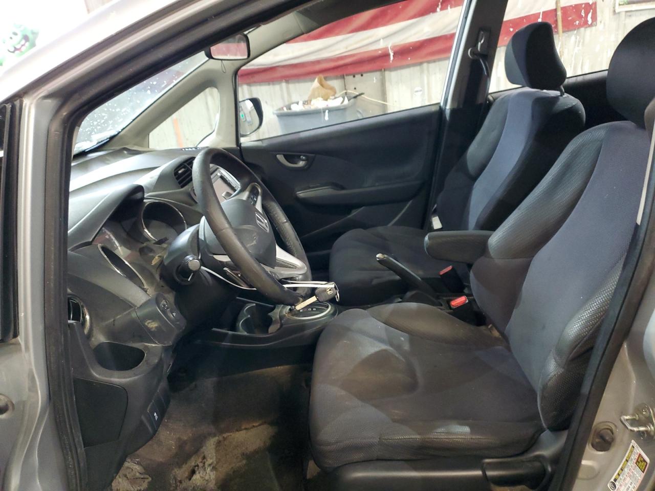 2012 Honda Fit VIN JHMGE8H63CC010627 Copart auction photo, front end / minor dent/scratches damage thumbnail 7