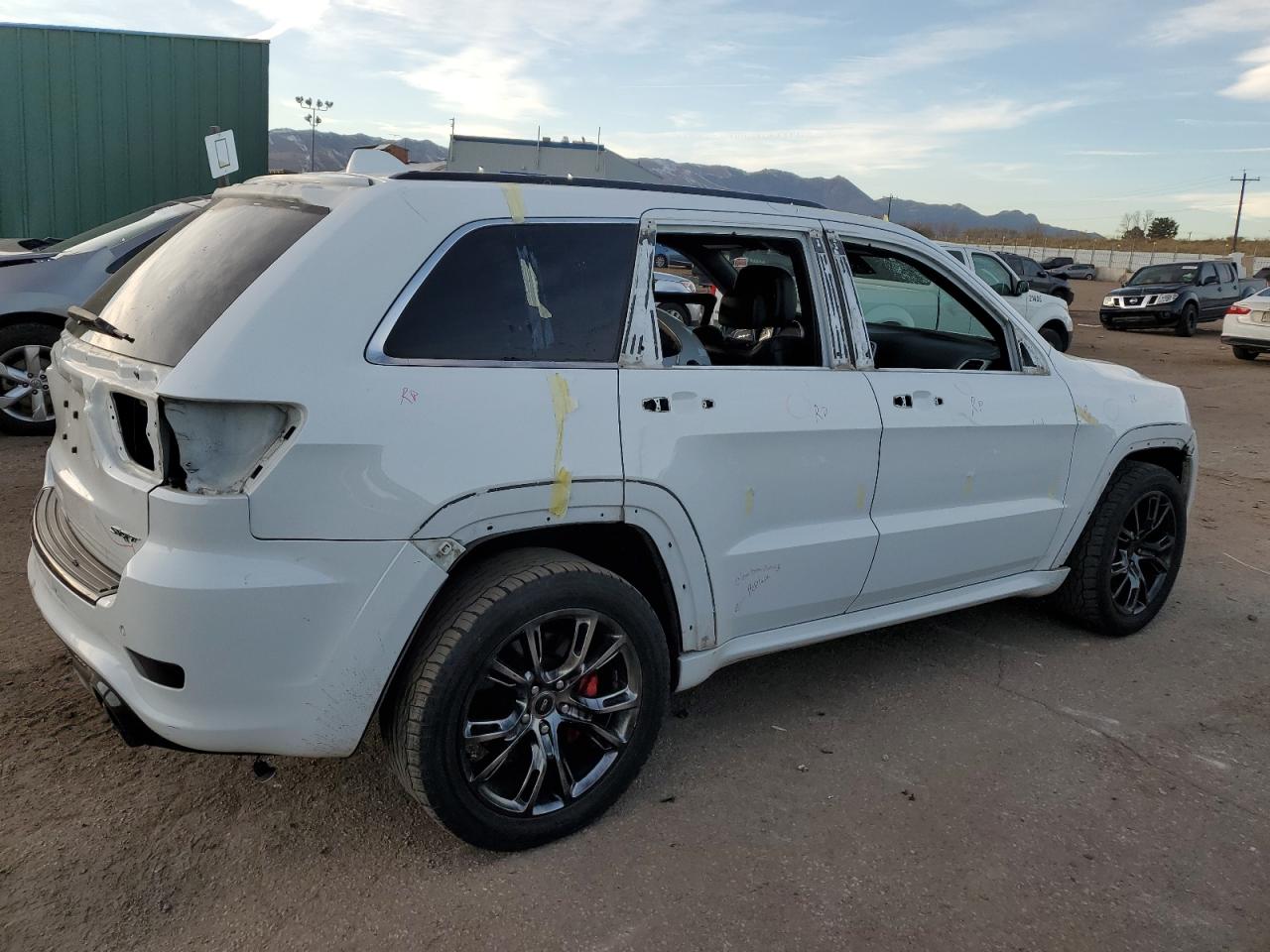 2014 Jeep Grand Cherokee VIN 1C4RJFDJ3EC245391 Copart auction photo, front end / side damage thumbnail 3