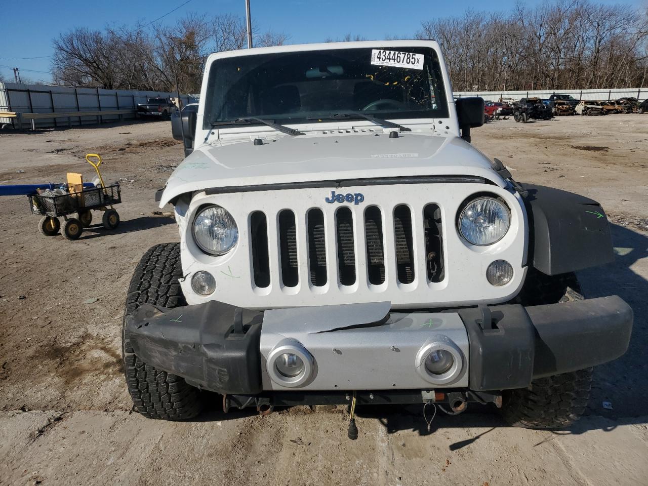 2016 Jeep Wrangler VIN 1C4BJWDG5GL145592 Copart auction photo, side / minor dent/scratches damage thumbnail 5