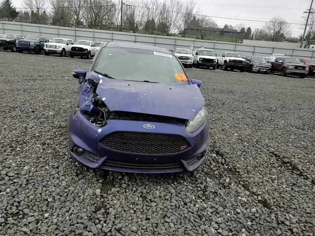 2015 Ford Fiesta VIN 3FADP4GX8FM124018 Copart auction photo, front end / rear end damage thumbnail 11