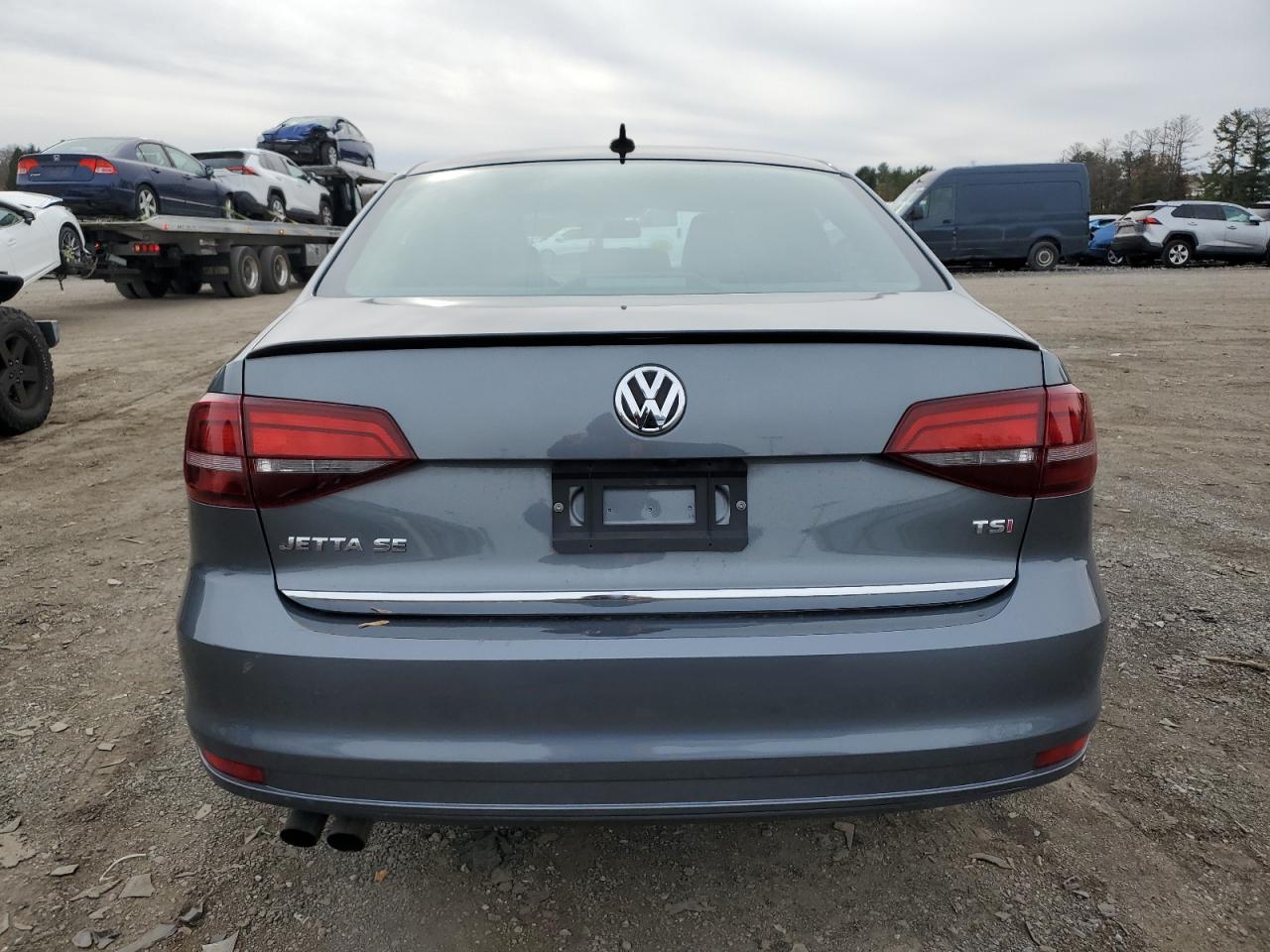 2018 Volkswagen Jetta VIN 3VWD17AJ2JM225952 Copart auction photo, side / minor dent/scratches damage thumbnail 6