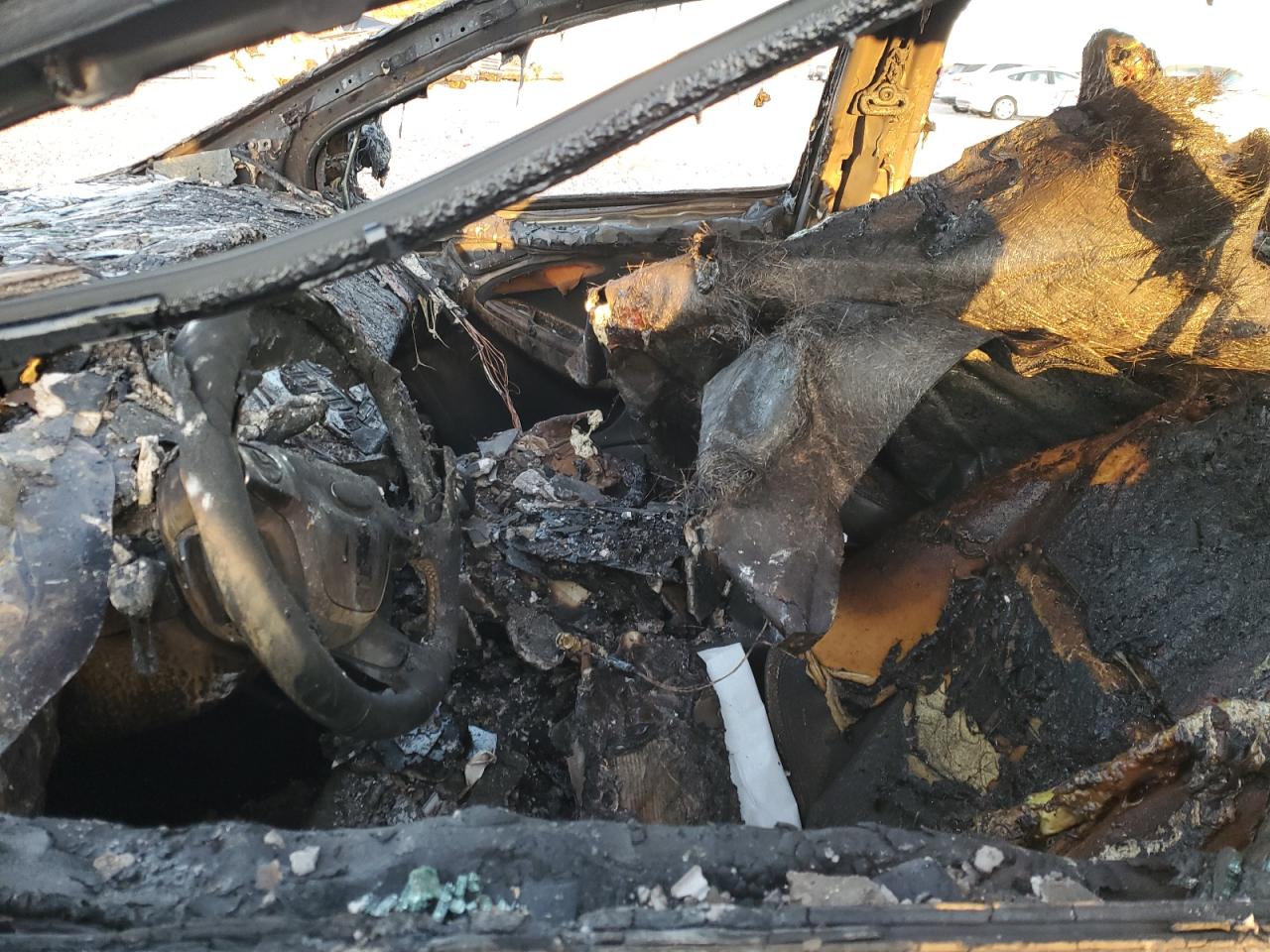 2012 Ford Focus VIN 1FAHP3M26CL362368 Copart auction photo, burn damage thumbnail 7
