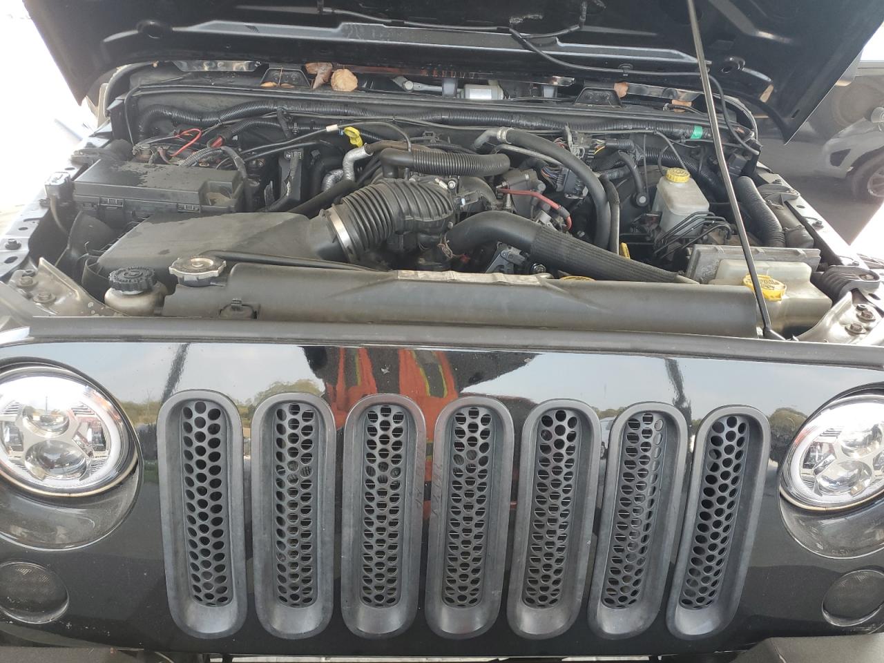 2011 Jeep Wrangler VIN 1J4BA3H1XBL565579 Copart auction photo, side damage thumbnail 11