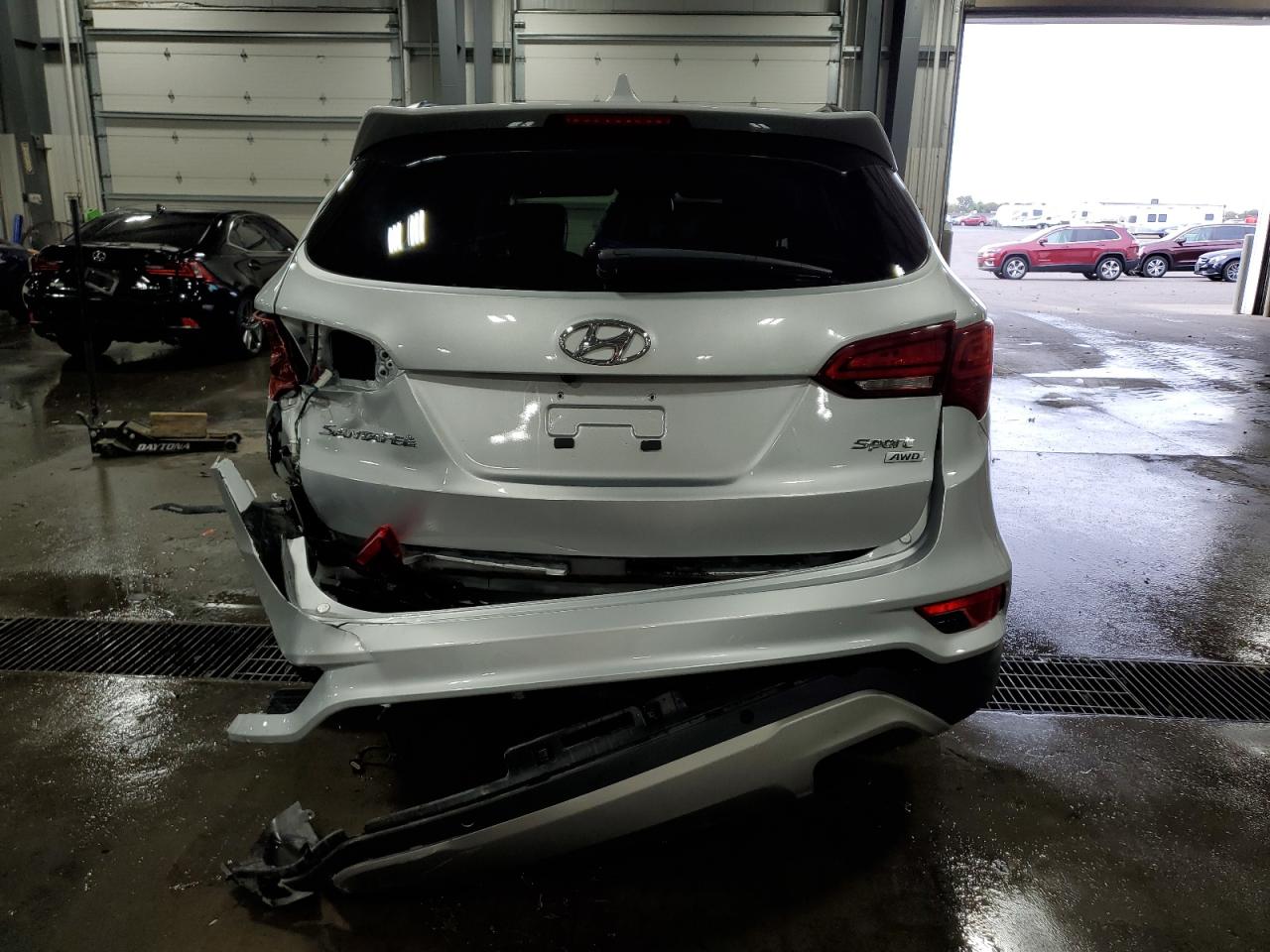 2017 Hyundai Santa Fe VIN 5XYZUDLB2HG491175 Copart auction photo, rear end damage thumbnail 6