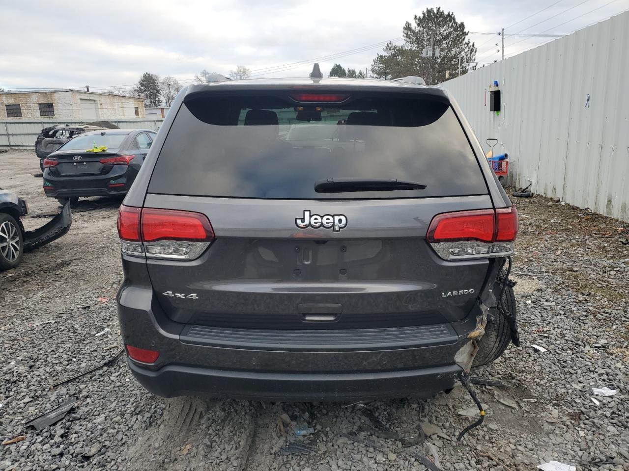 2021 Jeep Grand Cherokee VIN 1C4RJFAG4MC770161 Copart auction photo, rear end damage thumbnail 6