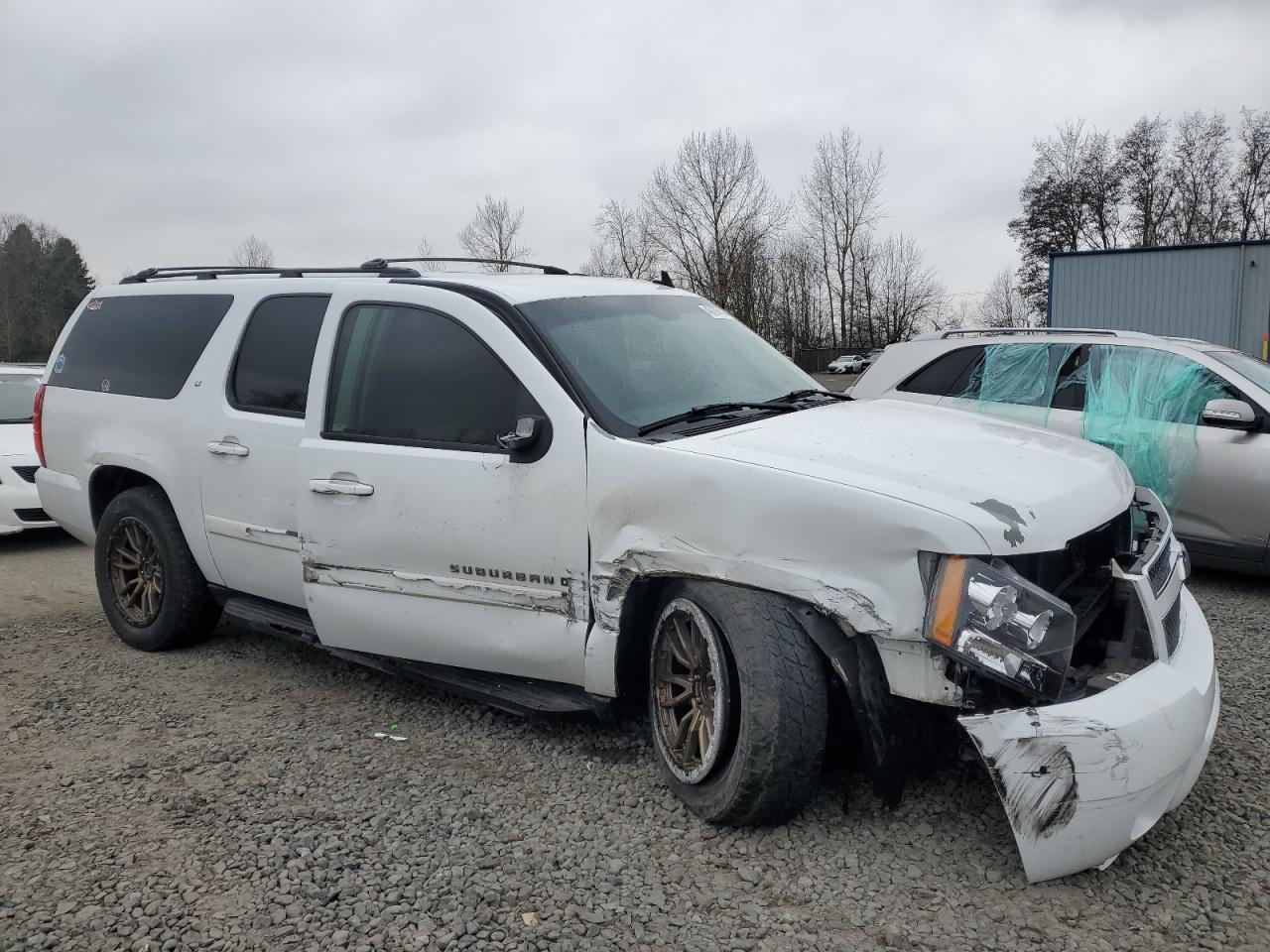 2007 Chevrolet Suburban VIN 1GNFK16357J363949 Copart auction photo, all over / undercarriage damage thumbnail 4