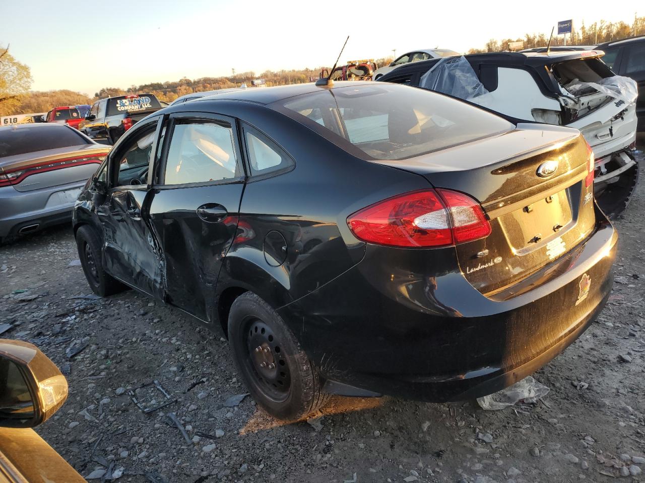 2013 Ford Fiesta VIN 3FADP4BJ5DM184290 Copart auction photo, side / front end damage thumbnail 2