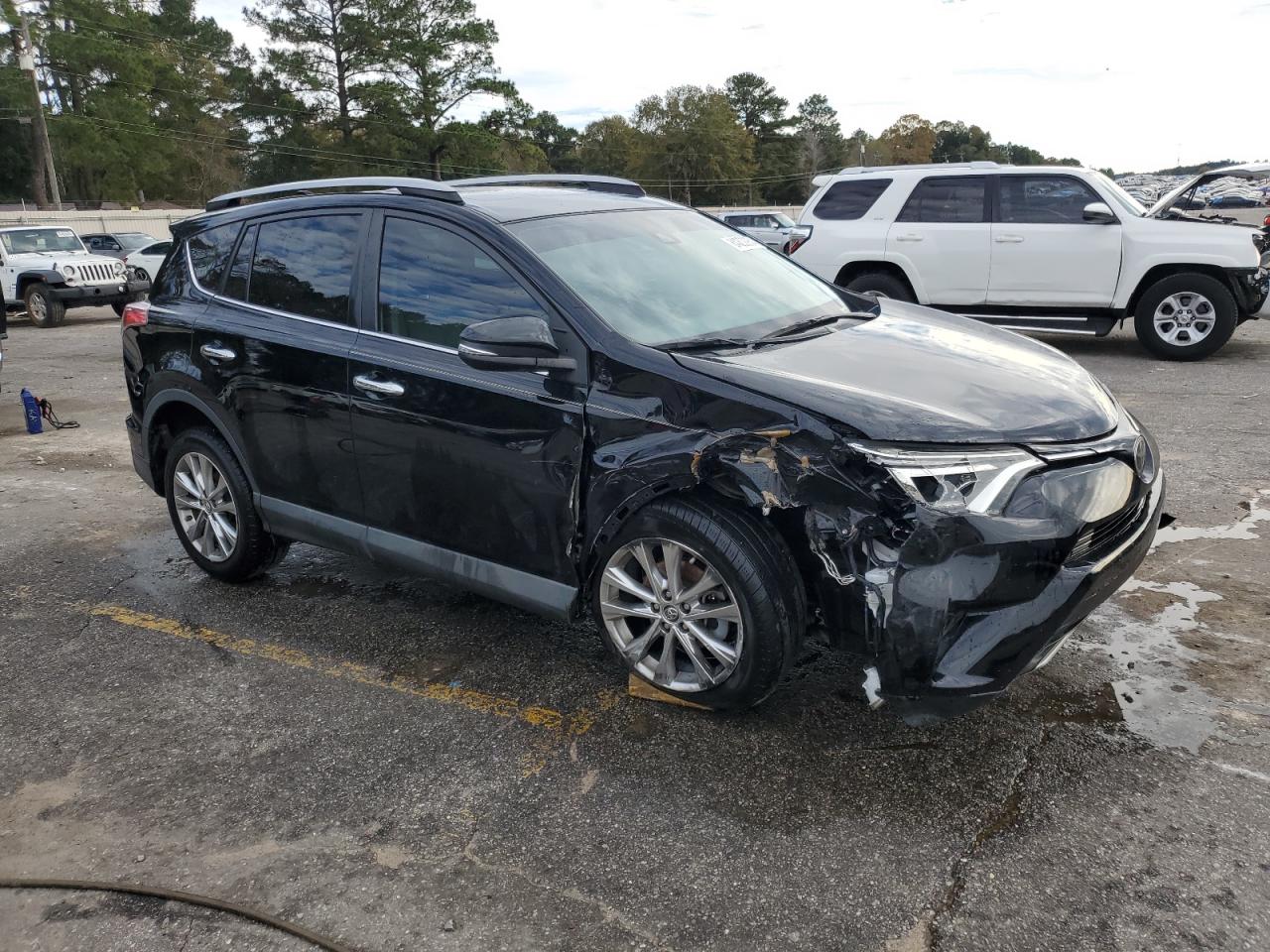 2018 Toyota RAV 4 VIN 2T3YFREV6JW471125 Copart auction photo, front end damage thumbnail 4