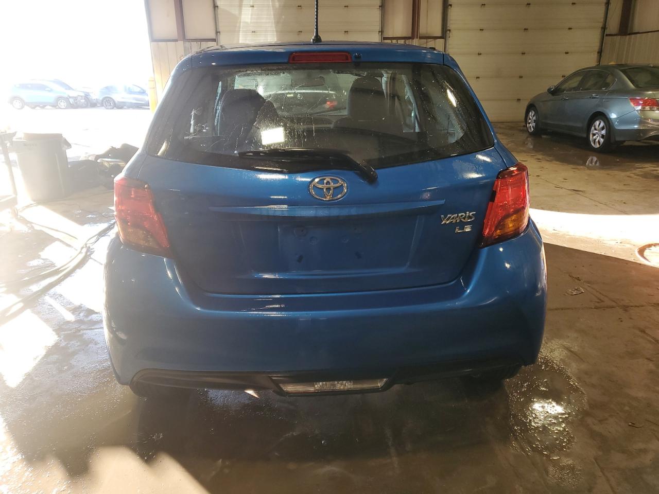 2015 Toyota Yaris VIN VNKKTUD30FA055893 Copart auction photo, side damage thumbnail 6