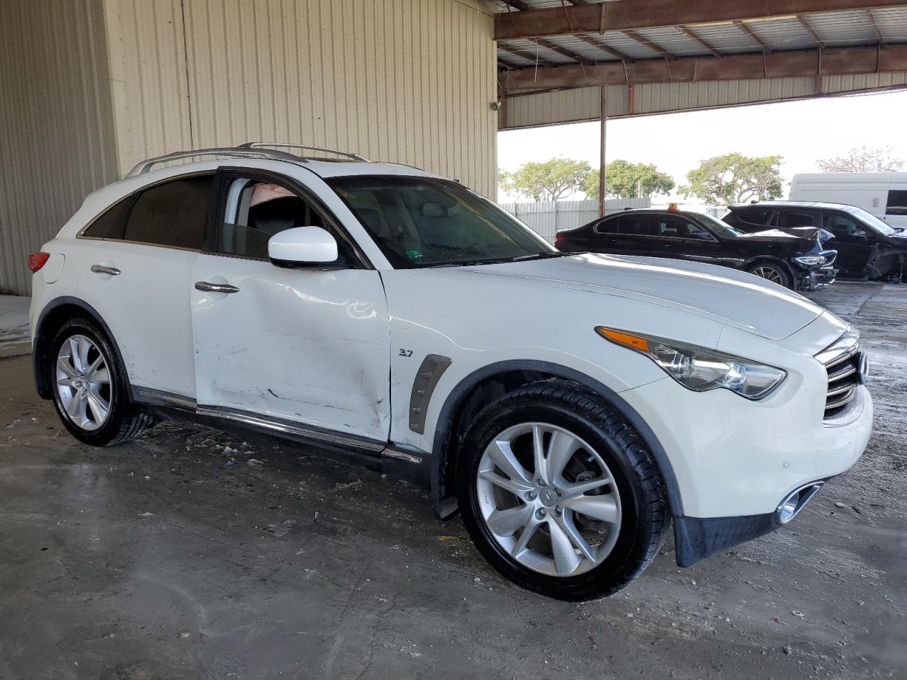 2014 Infiniti QX70 VIN JN8CS1MWXEM413141 Copart auction photo, side / minor dent/scratches damage thumbnail 4