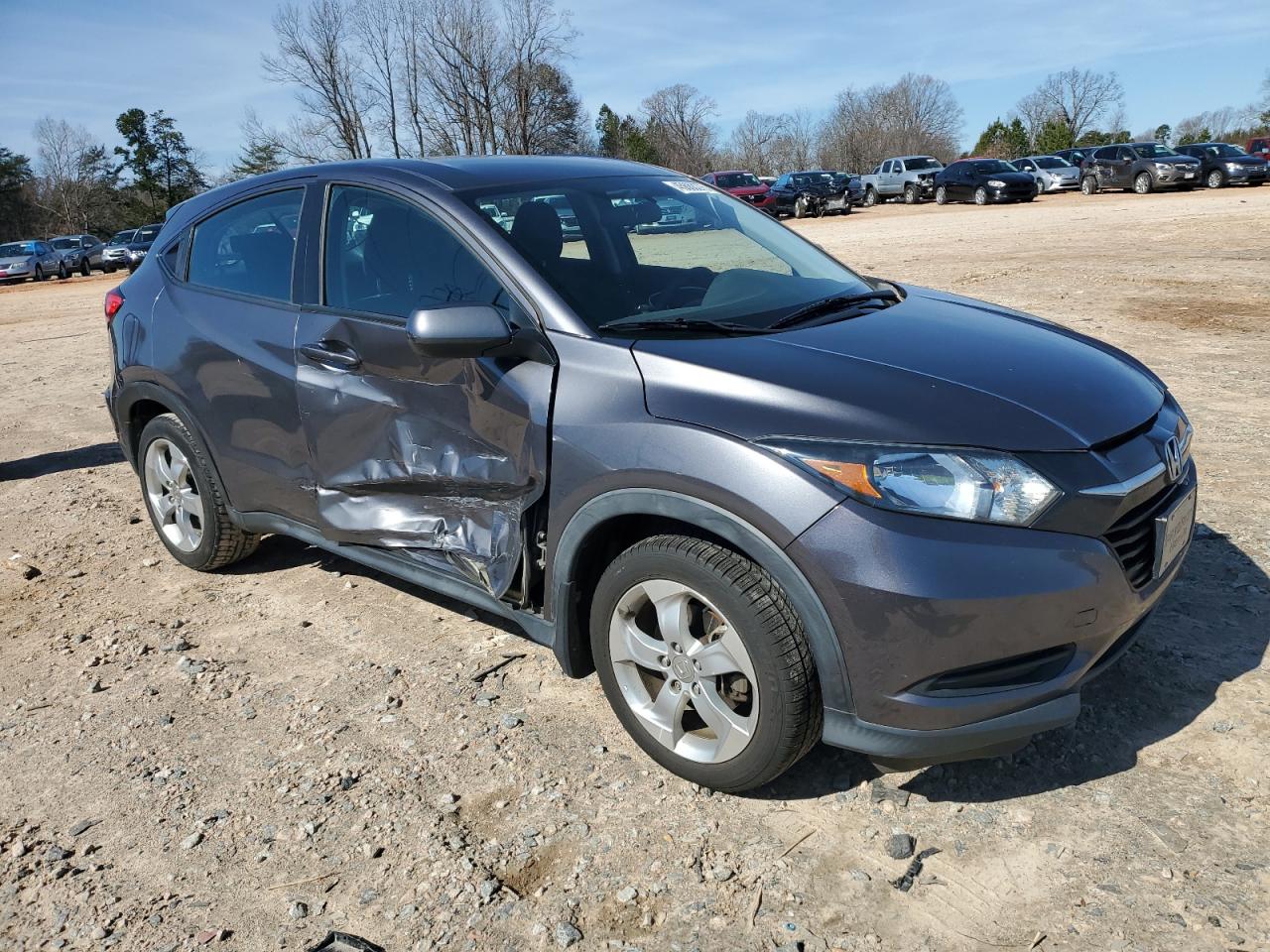 2016 Honda HR-V VIN 3CZRU5H3XGM740910 Copart auction photo, side damage thumbnail 4