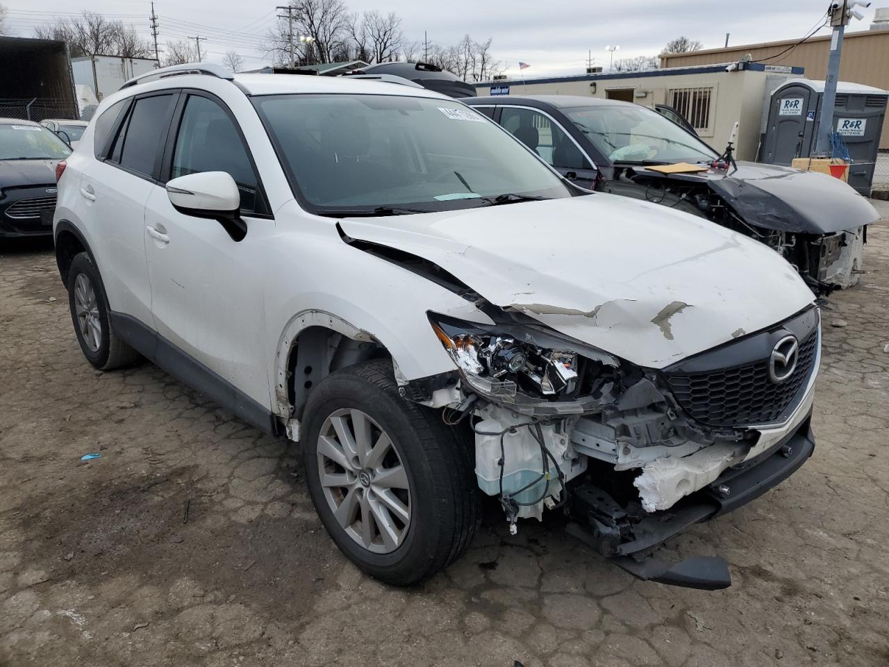 2015 Mazda CX-5 VIN JM3KE4BY6F0485829 Copart auction photo, front end / side damage thumbnail 4