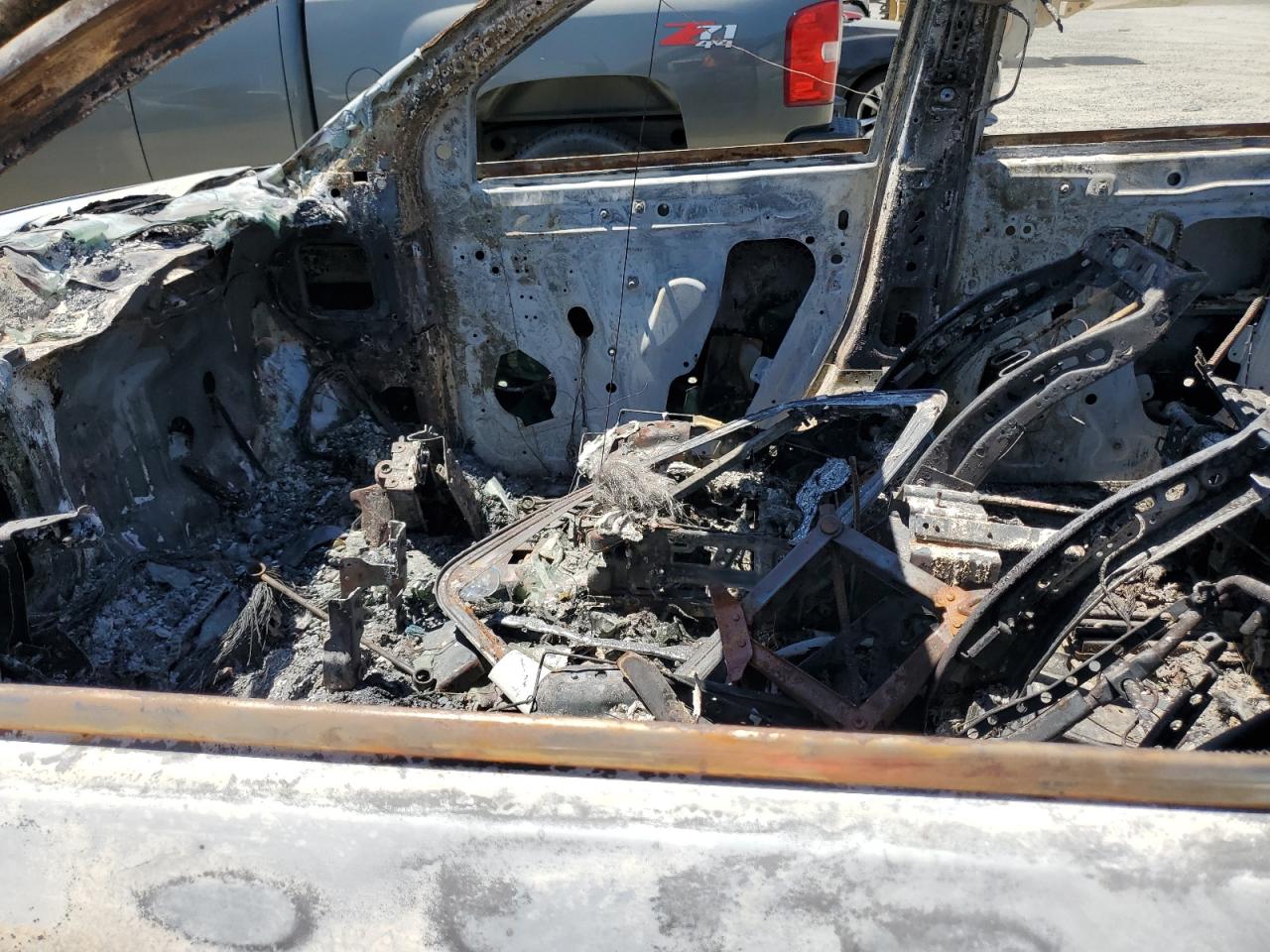 2007 GMC Acadia VIN 1GKEV33767J150186 Copart auction photo, burn damage thumbnail 7