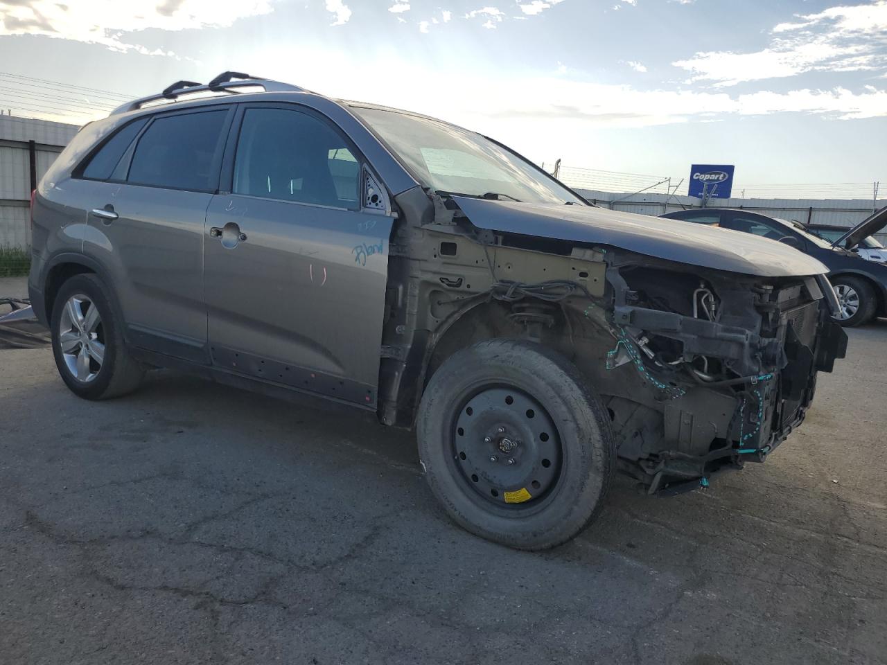 2012 KIA Sorento VIN 5XYKU4A21CG235378 Copart auction photo, front end / side damage thumbnail 4