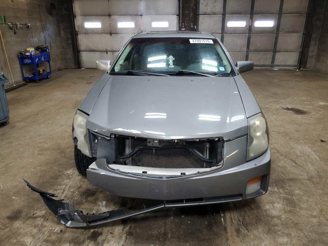 2004 Cadillac CTS VIN 1G6DM577540186441 Copart auction photo, front end / rear end damage thumbnail 5