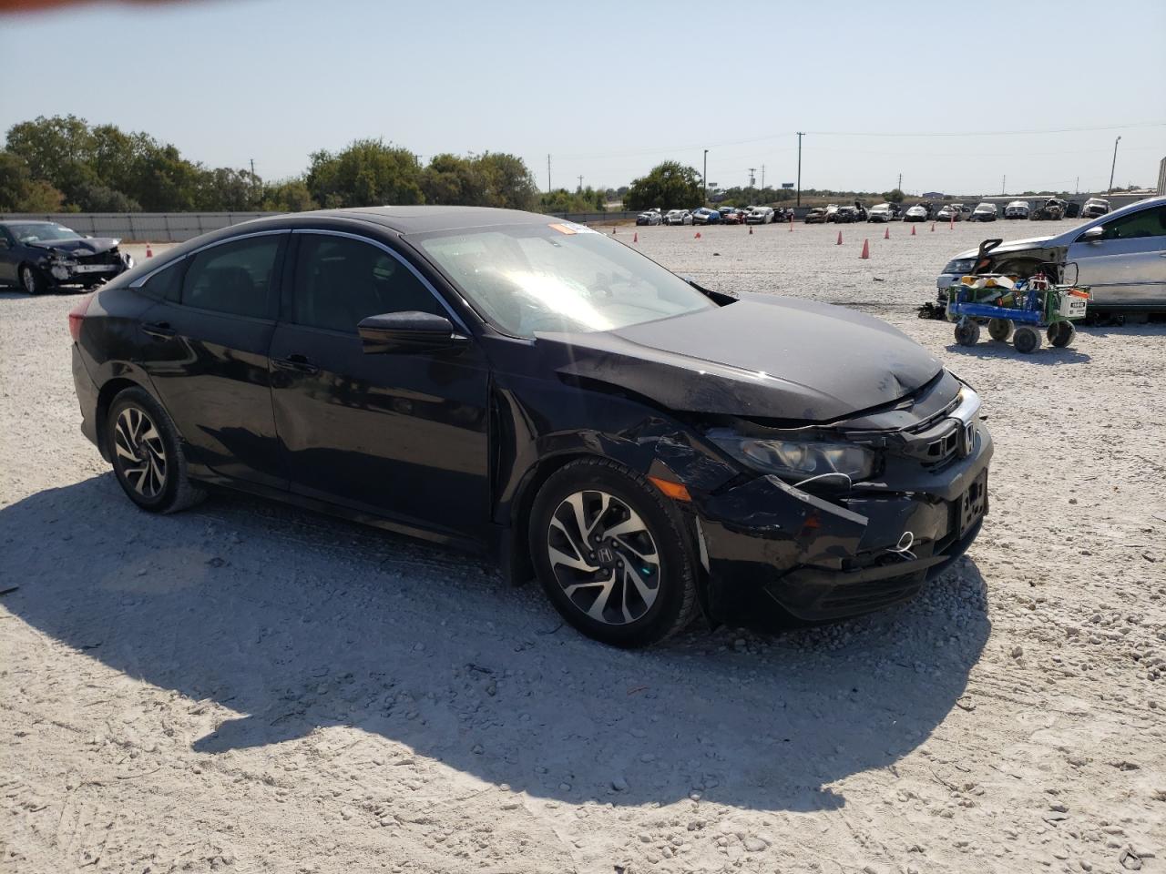 2017 Honda Civic VIN 19XFC2F70HE064818 Copart auction photo, front end / side damage thumbnail 4