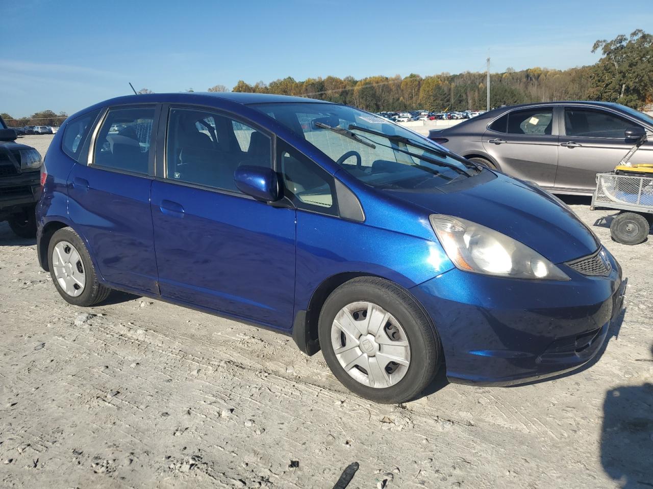 2012 Honda Fit VIN JHMGE8H31CC026685 Copart auction photo, side / rear end damage thumbnail 4