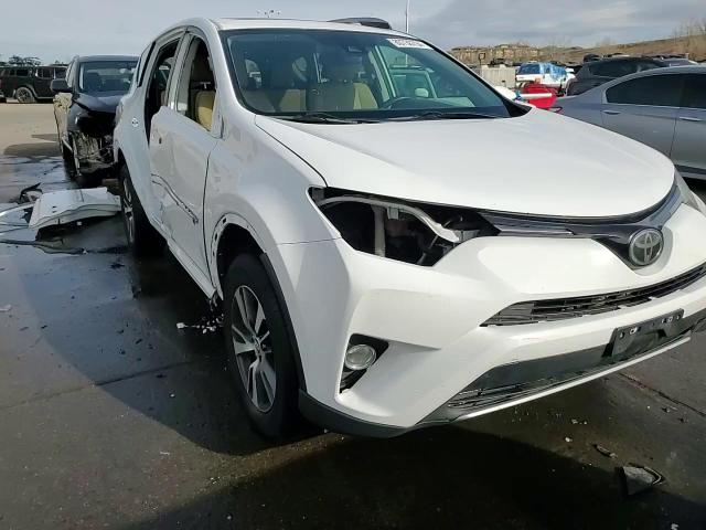 2017 Toyota RAV 4 VIN 2T3RFREV8HW600772 Copart auction photo, side / front end damage thumbnail 15