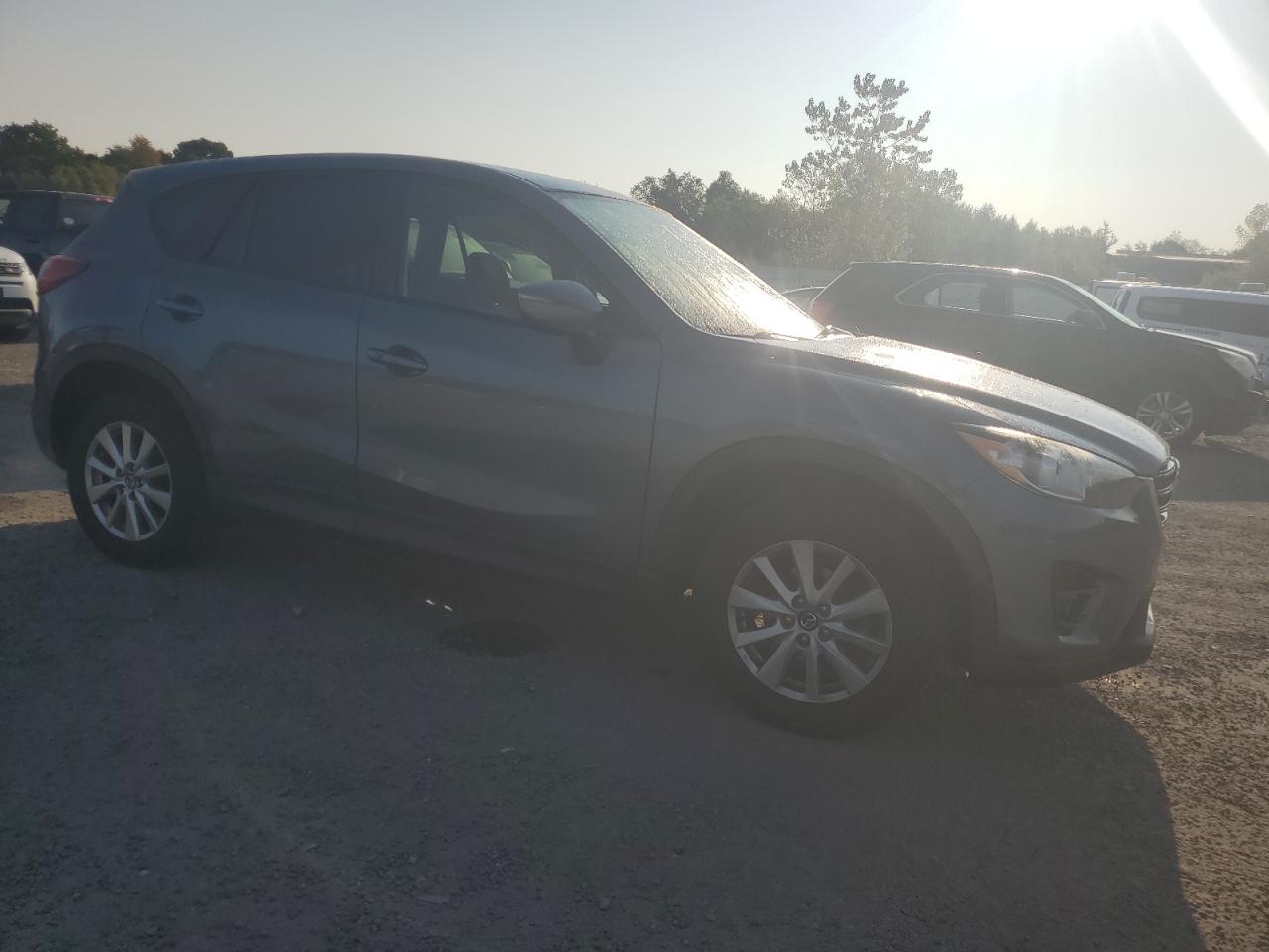 2016 Mazda CX-5 VIN JM3KE4CY1G0691446 Copart auction photo, front end damage thumbnail 4