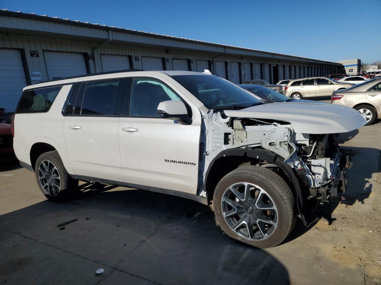 2023 Chevrolet Suburban VIN 1GNSKEKD1PR482054 Copart auction photo, front end / side damage thumbnail 4