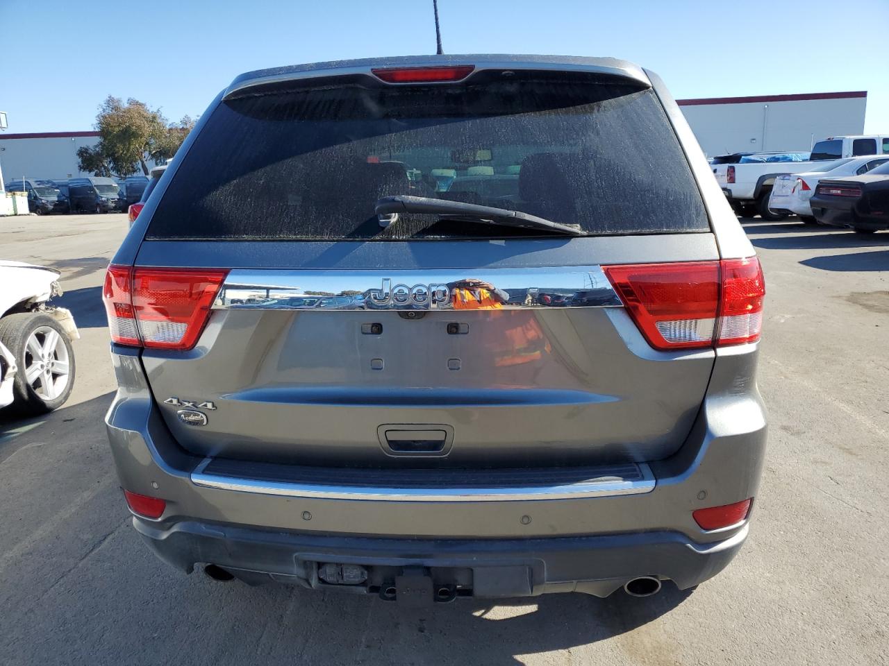 2013 Jeep Grand Cherokee VIN 1C4RJFCT4DC523281 Copart auction photo, minor dent/scratches damage thumbnail 6