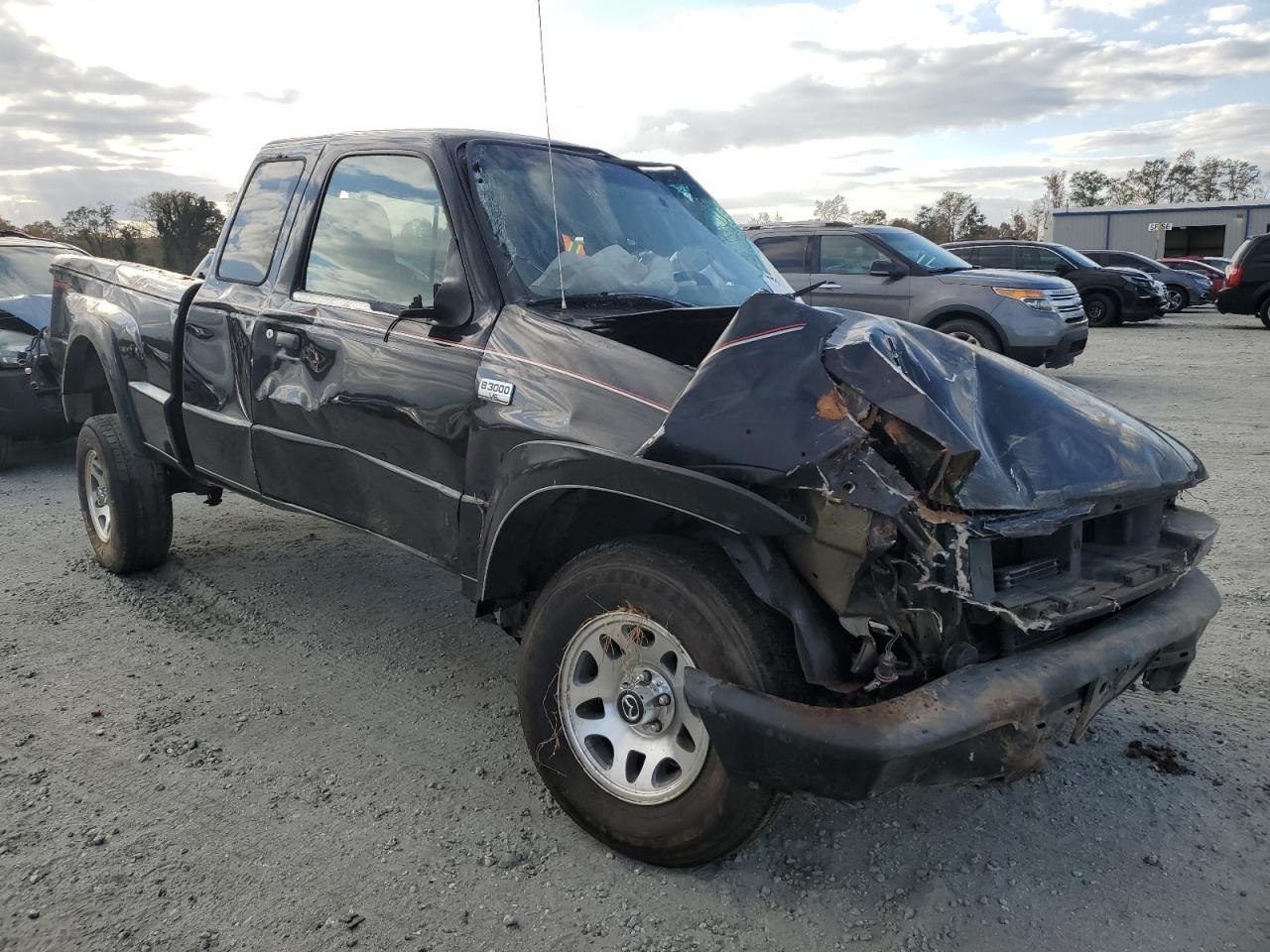 2004 Mazda B-series VIN 4F4YR16UX4TM00703 Copart auction photo, all over / minor dent/scratches damage thumbnail 4