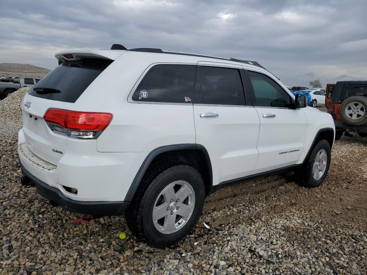 2015 Jeep Grand Cherokee VIN 1C4RJFBGXFC799746 Copart auction photo, front end / rear end damage thumbnail 3