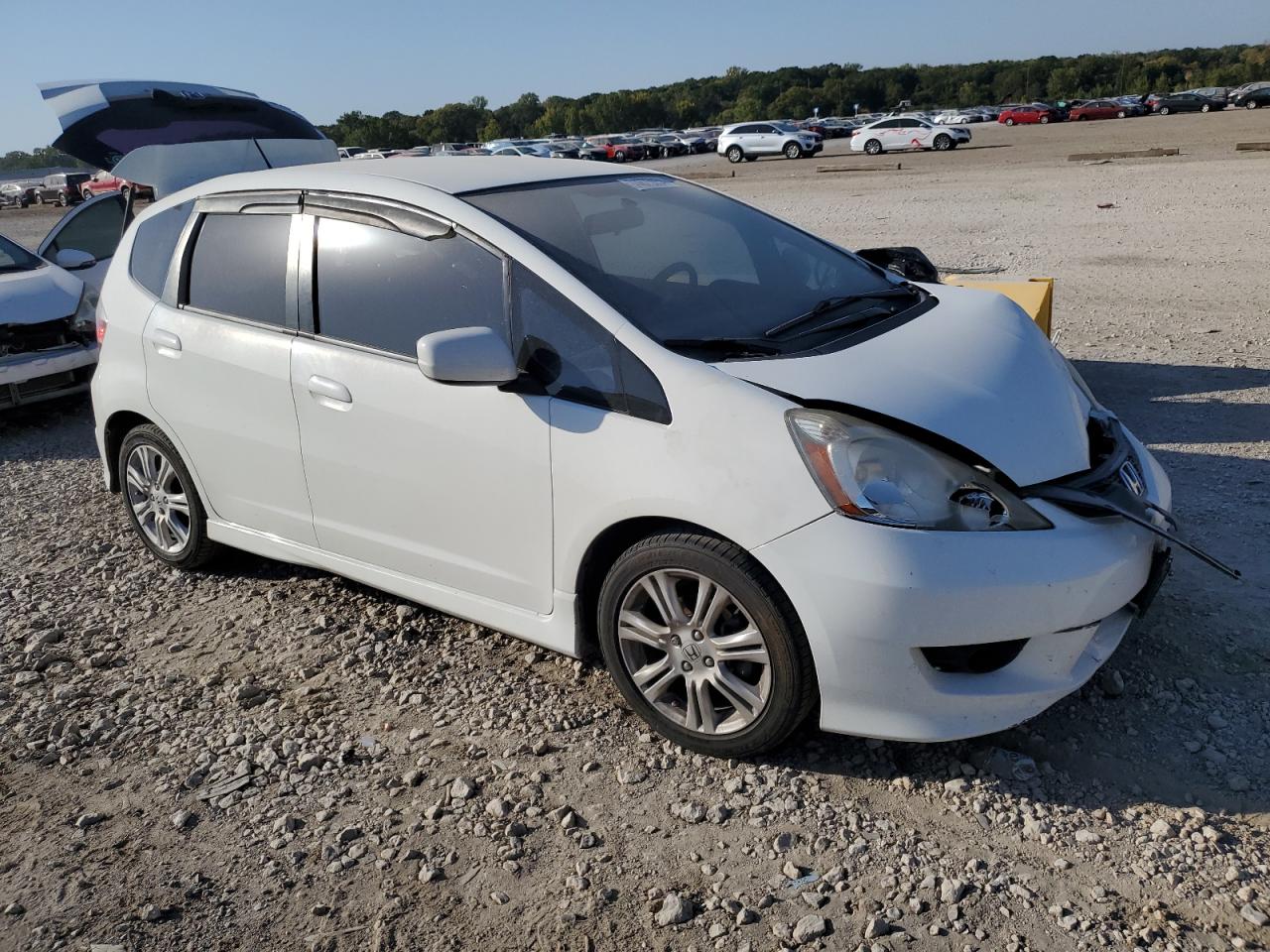 2009 Honda Fit VIN JHMGE88669S067029 Copart auction photo, front end damage thumbnail 4
