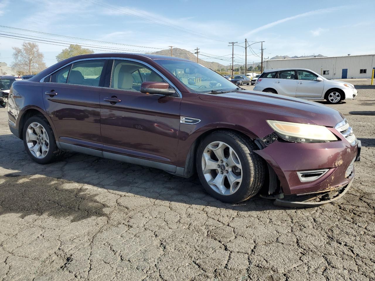 2011 Ford Taurus VIN 1FAHP2EW2BG117568 Copart auction photo, front end damage thumbnail 4