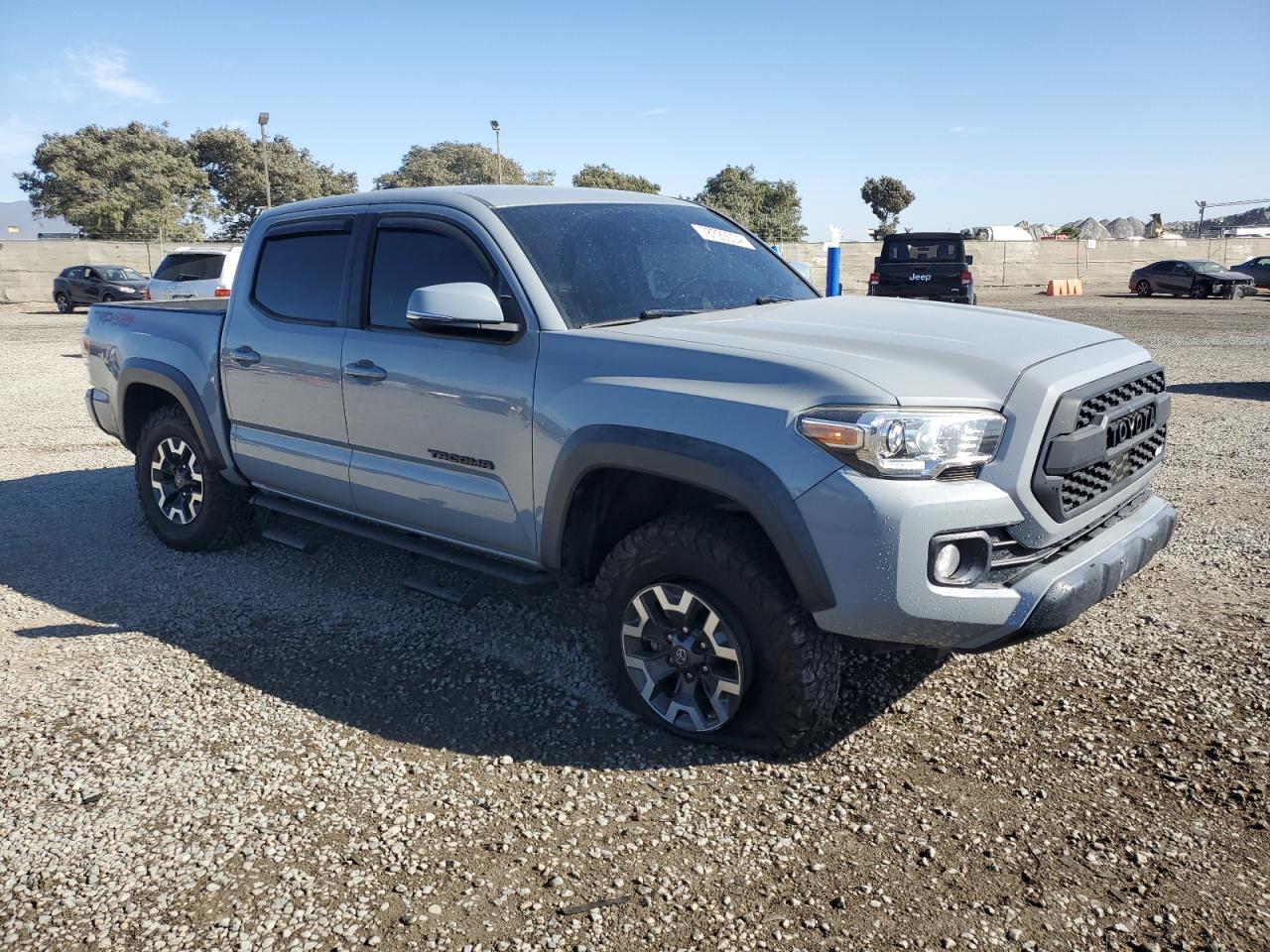 2020 Toyota Tacoma VIN 3TMCZ5AN5LM328770 Copart auction photo, side / rear end damage thumbnail 4