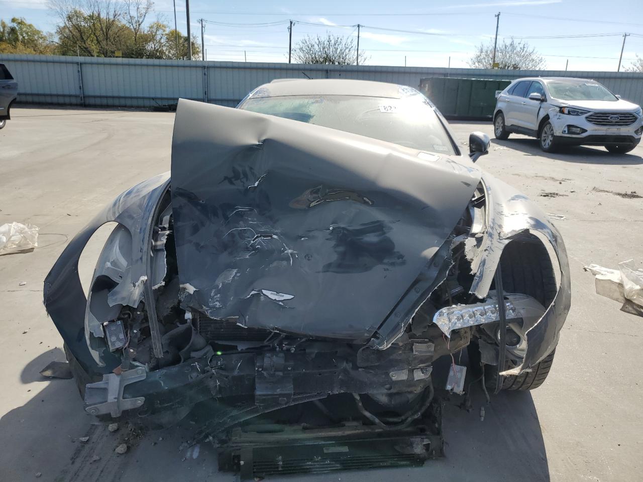 2011 Aston Martin Rapide VIN SCFHDDAJXBAF01954 Copart auction photo, front end / side damage thumbnail 5