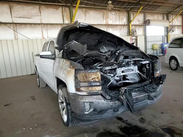2017 Chevrolet Silverado VIN 3GCUKREC3HG319502 Copart auction photo, burn / front end damage thumbnail 10