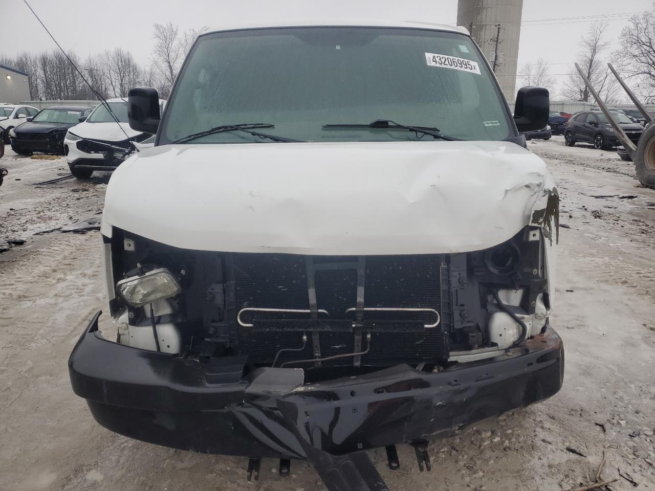 2011 Chevrolet Express VIN 1GCWGFCA5B1134674 Copart auction photo, front end damage thumbnail 5