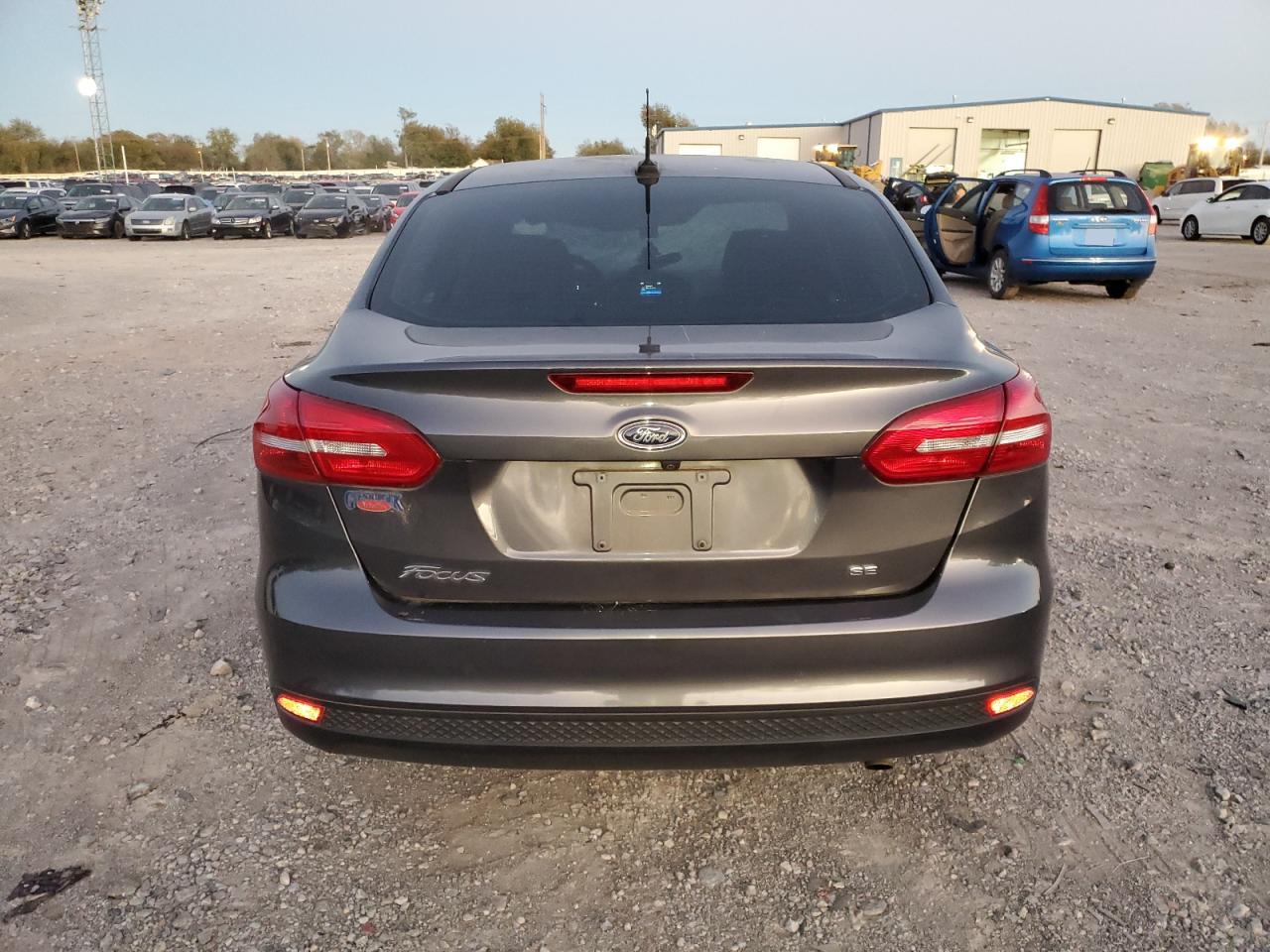 2017 Ford Focus VIN 1FADP3F2XHL313953 Copart auction photo, front end / top/roof damage thumbnail 6