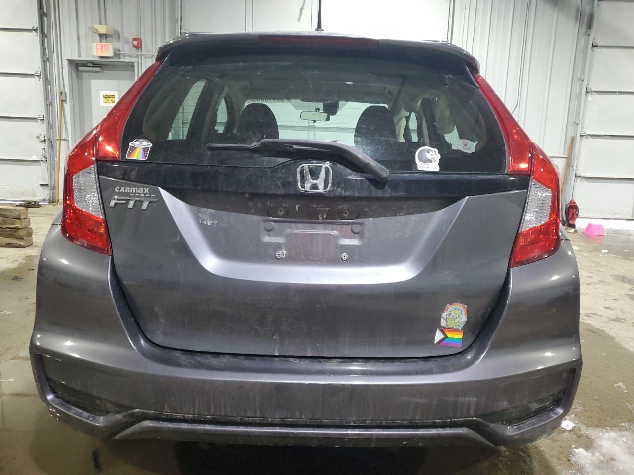 2018 Honda Fit VIN 3HGGK5H56JM700529 Copart auction photo, side / front end damage thumbnail 6